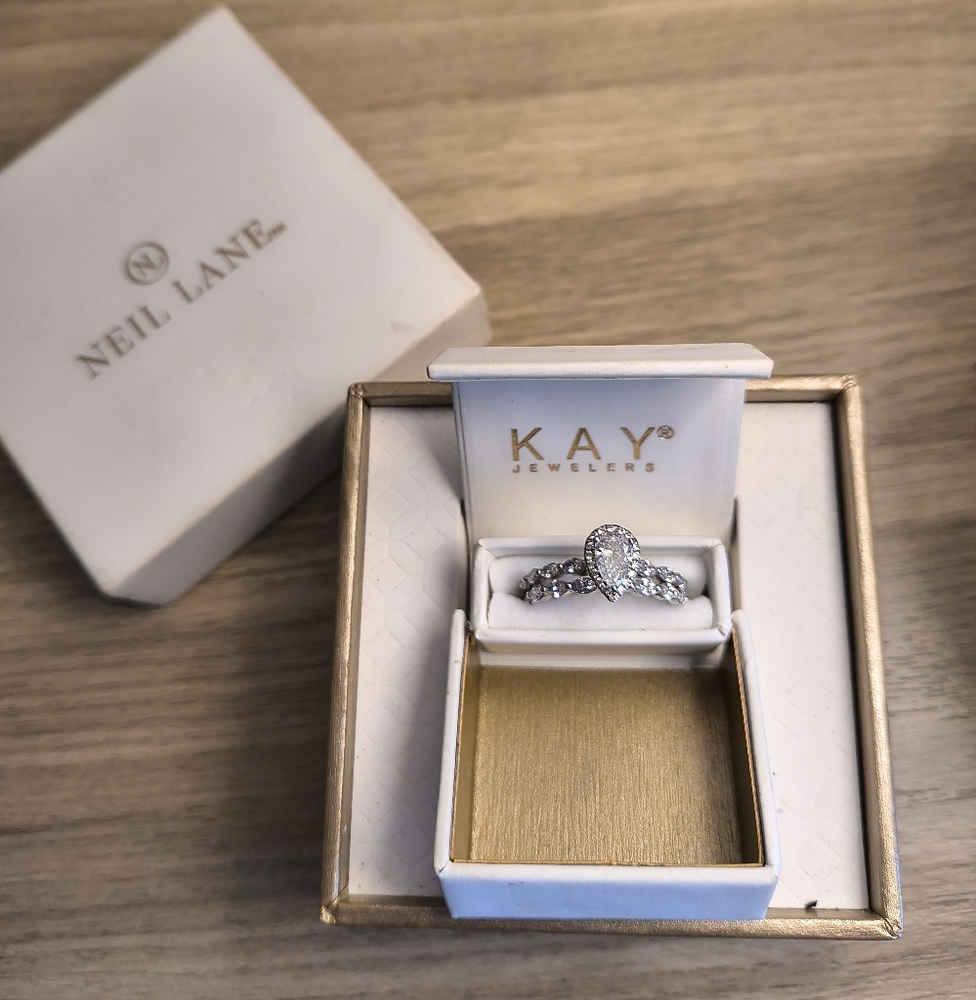 Neil Lane Pear Center Diamond with Marquise side diamond and wedding band. 14k w